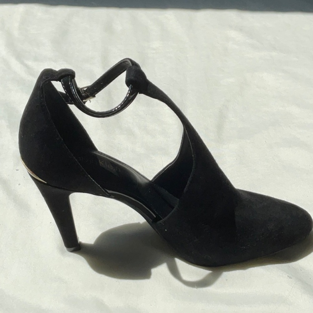 Calvin Klein black suede shoes.